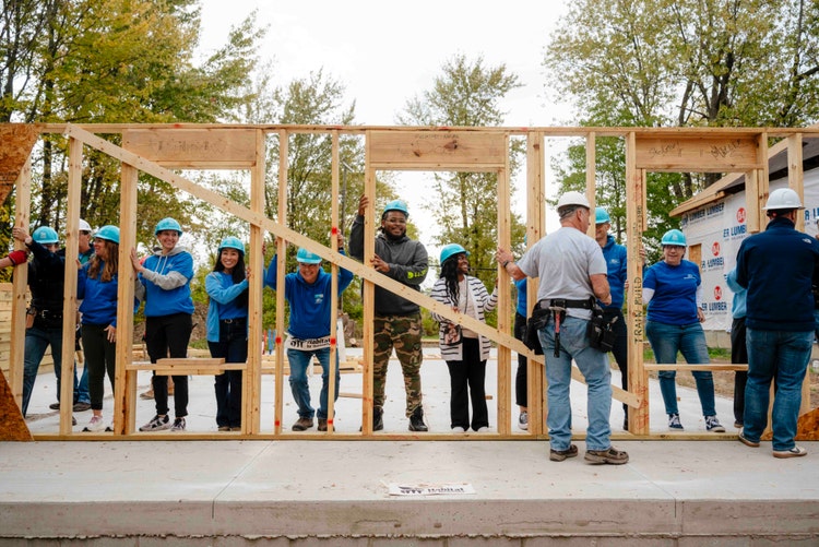 Ford Volunteers helping build a home