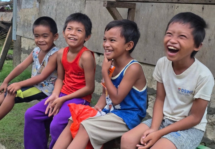 Young Philippino kids laughing
