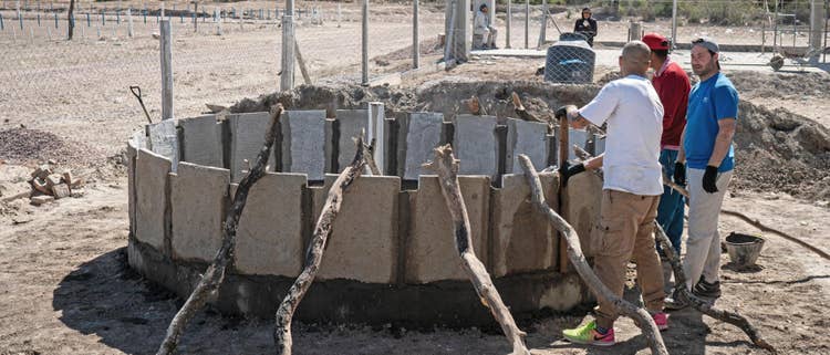 A person working on a construction site AI-generated content may be incorrect.