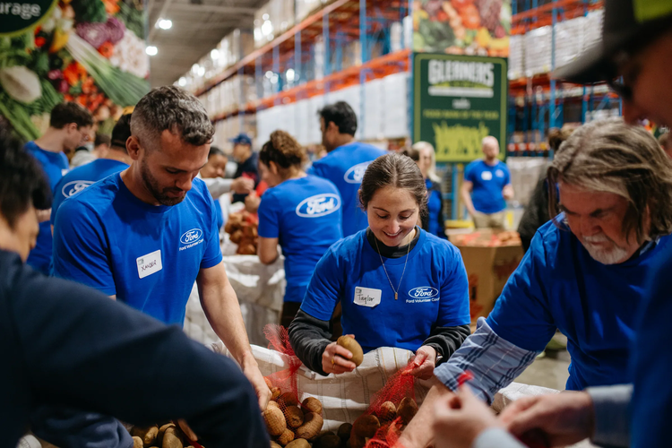 Ford volunteers at work in the Gleaners food warehouse