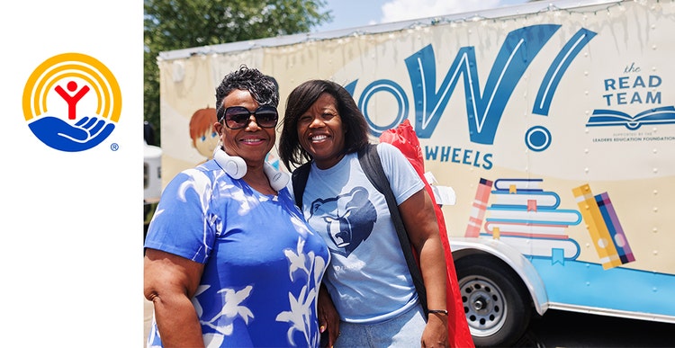 United Way logo with a photo of two ladies in from of a WOW Read Team truck