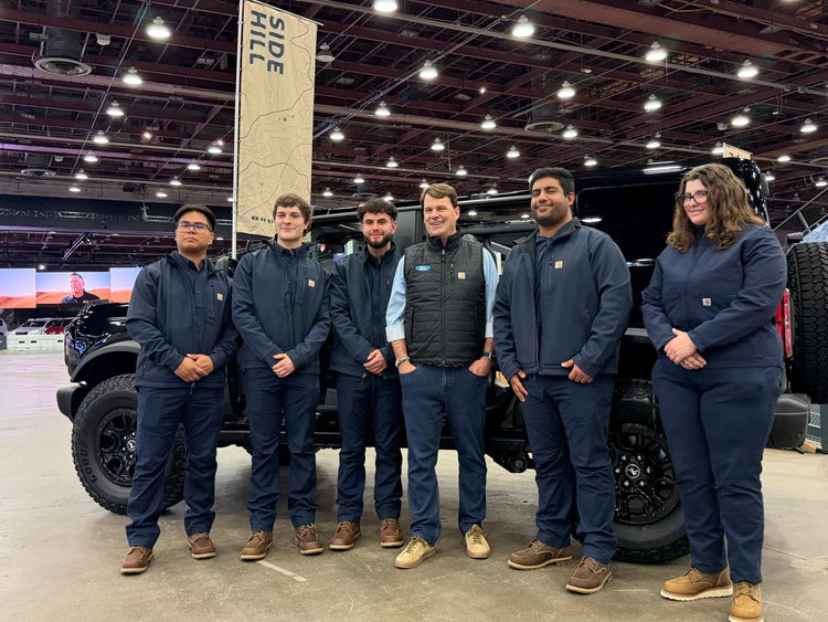 A lineup of young technicians